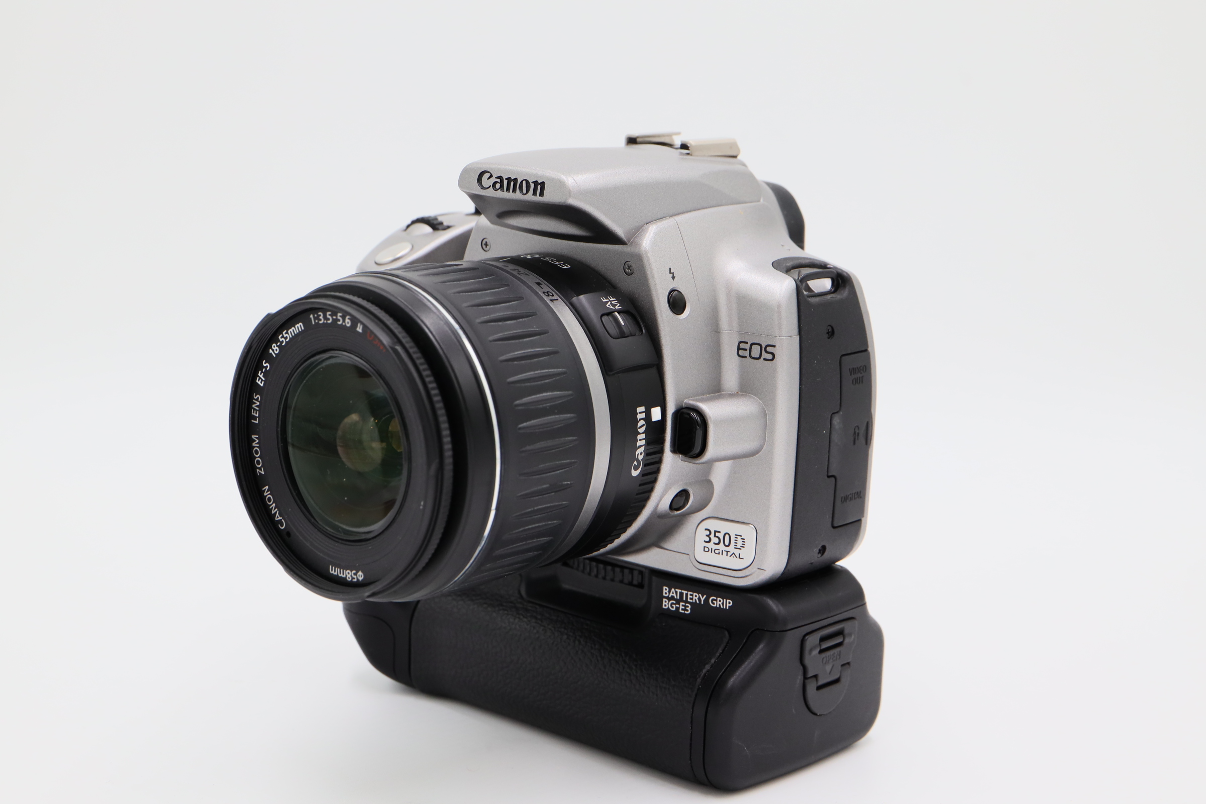 Canon eos 350d. Canon EOS 350d in hands.